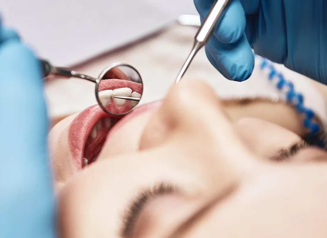A dentist at Wildomar Smiles Dentistry caring for a patient