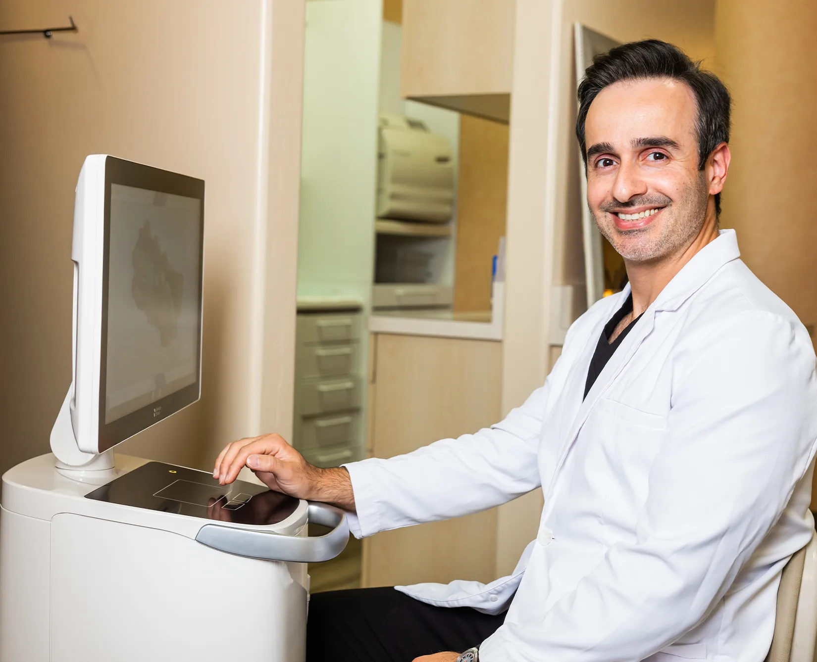 Dr. Hamed Koushyar with digital scanning technology at Wildomar Smiles Dentistry in Wildomar, CA